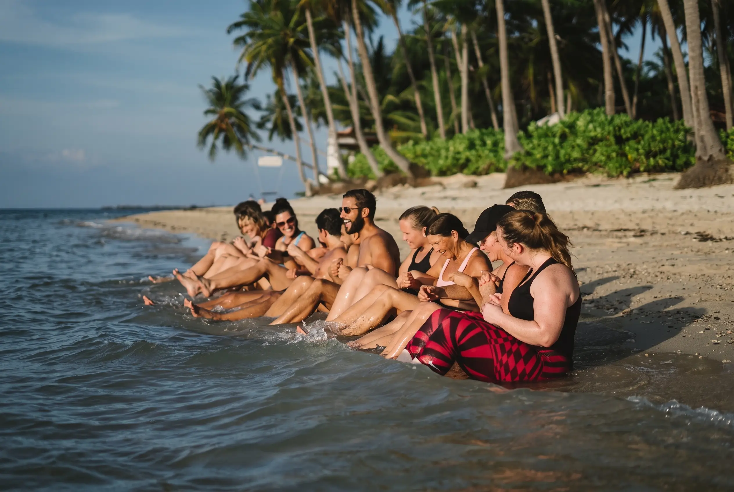 Séance d'entraînement en groupe sur la plage
